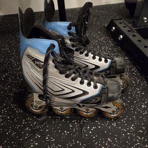 CCM Black and Silver Rollerblades